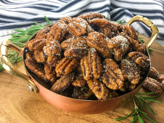 bold southern pecans roasted sweet and savory in a copper bowl and ready to devower 
