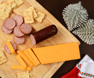 Summer Sausage and cheese on charcuterie with crackers 